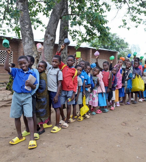 Children queueing for porridge, Malawi