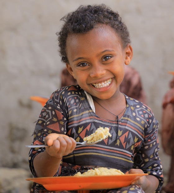 Child eating thier school meal