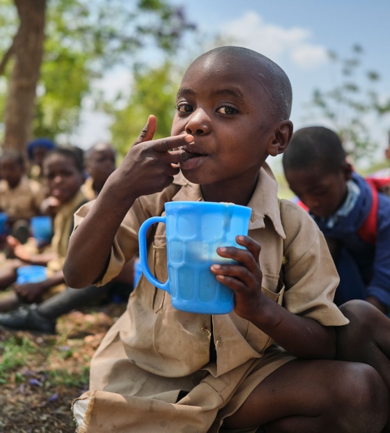 Children in Zambia eating their school meal