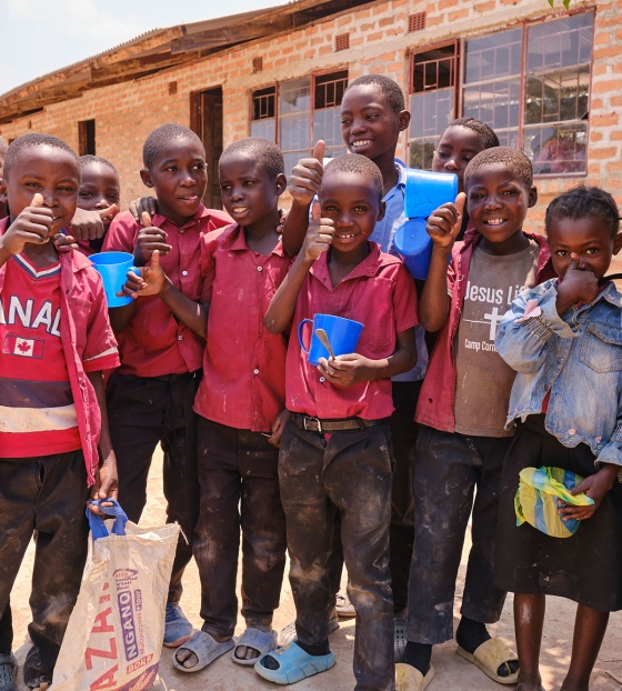An image of a group of children in Zambia who receive school meals