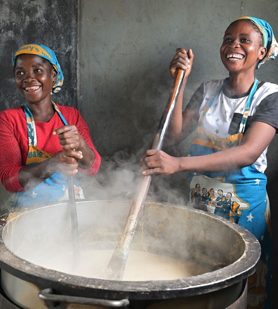 Image of cooks preparing school meals