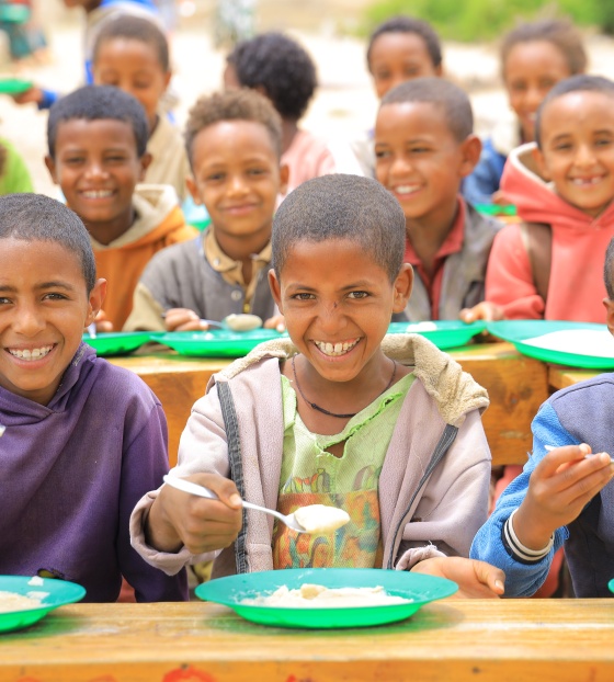 Children in Ethiopia eating Mary's Meals 