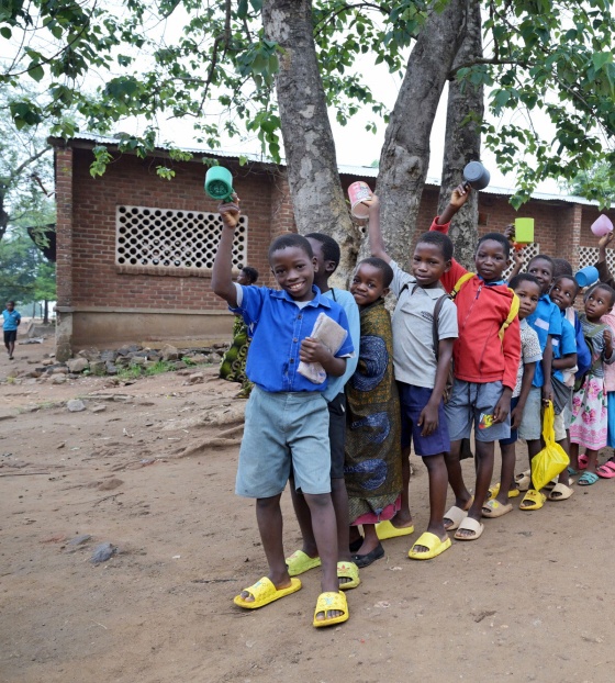 An image of children waiting for Marys Meals