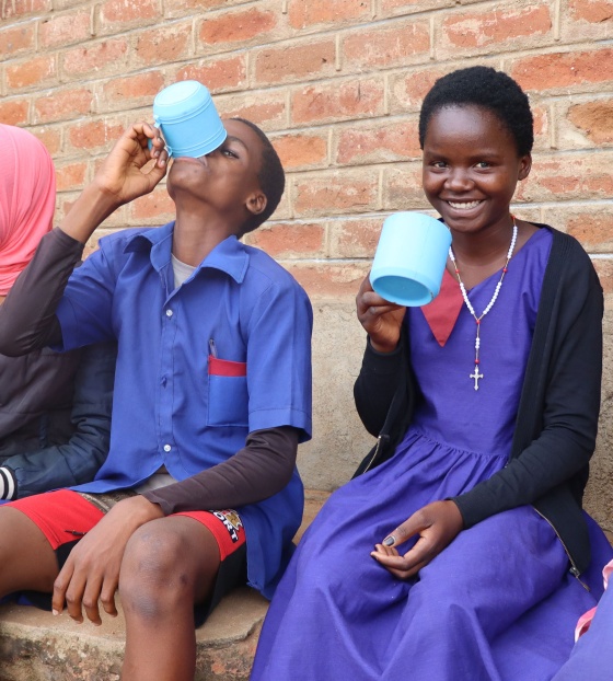 Image of a group of children enjoying their school meals