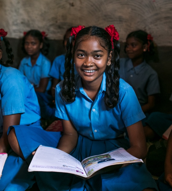 Children smiling in the classroom