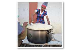 An Ethiopian cook making Marys Meals for displaced communities