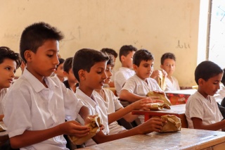 Boys at their desks in classroom