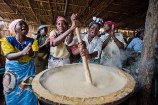 Volunteers cooking Marys Meals for their children