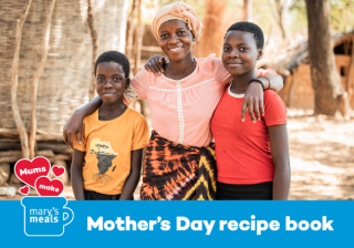 Cover of Mother's Day recipe book, image of mother standing between two daughters