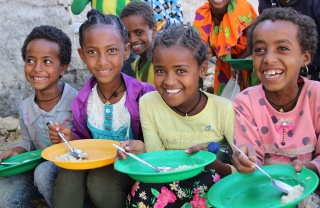 Childen enjoying Marys Meals in Ethiopia