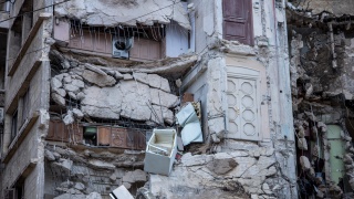 Kitchen cupboards visible within destroyed apartments from earthquake  in Syria