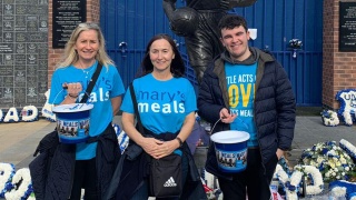 Volunteers collecting funds for Marys Meals