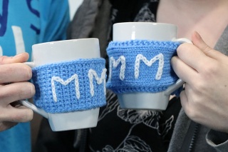 image of mug with marys meals knitted mug hugger