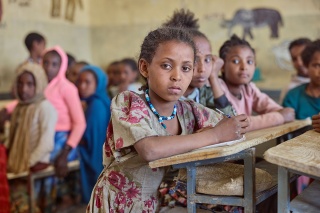 Child in classroom in Ethiopia