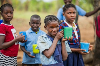 Child eating Mary's Meals