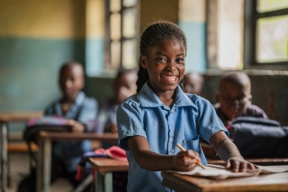 Girl in class in Zambia