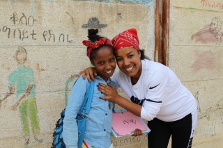 Lydia, left, hugged by her mother, Shewit, left.
