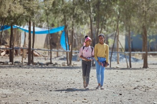 Amlak and friend walking to school, Tigray