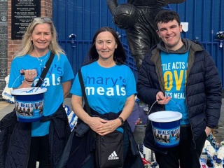 Image of volunteers doing a bucket collection