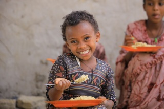 Image of child eating school meal