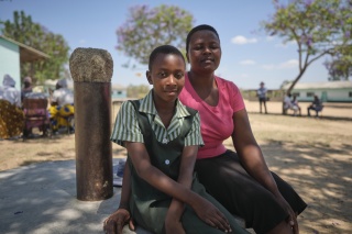 Kelcy and her mum Brenda sit outside