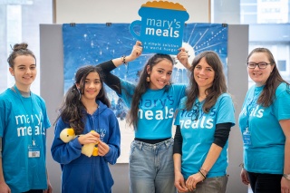Image of Marys Meals volunteers hosting an event