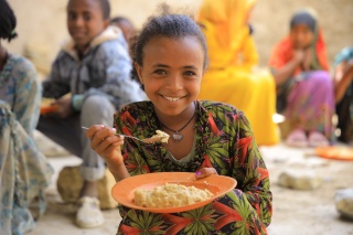 Child eating Mary's Meals in Ethiopia